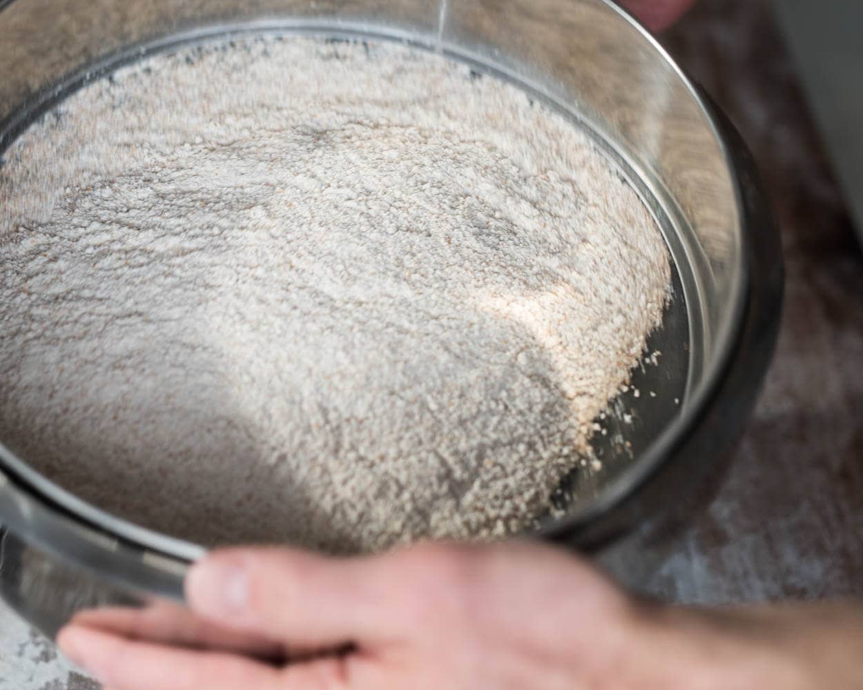 Sifting out bran from whole wheat flour