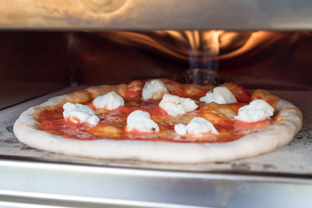 A More Whole Wheat Sourdough Pizza Dough via @theperfectloaf