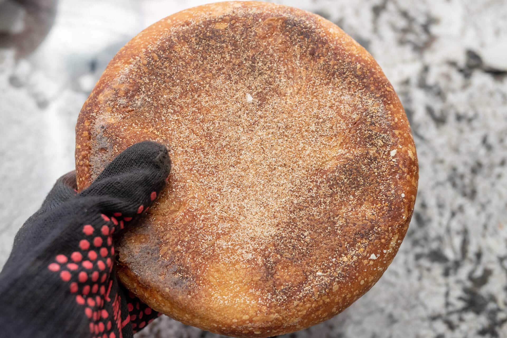 Bottom of the baked boule with wheat germ/bran is used as an insulator.