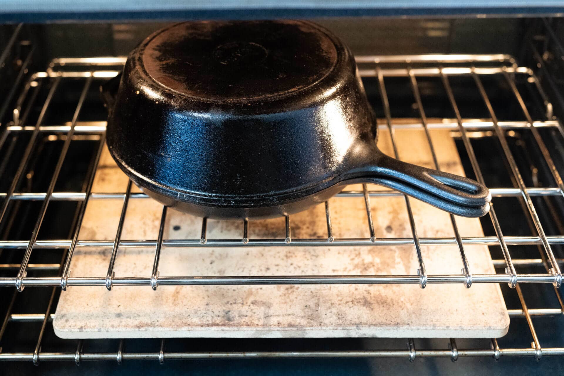 Prevent your bread from burning when baking in a Dutch oven by placing a baking sheet or baking stone below.