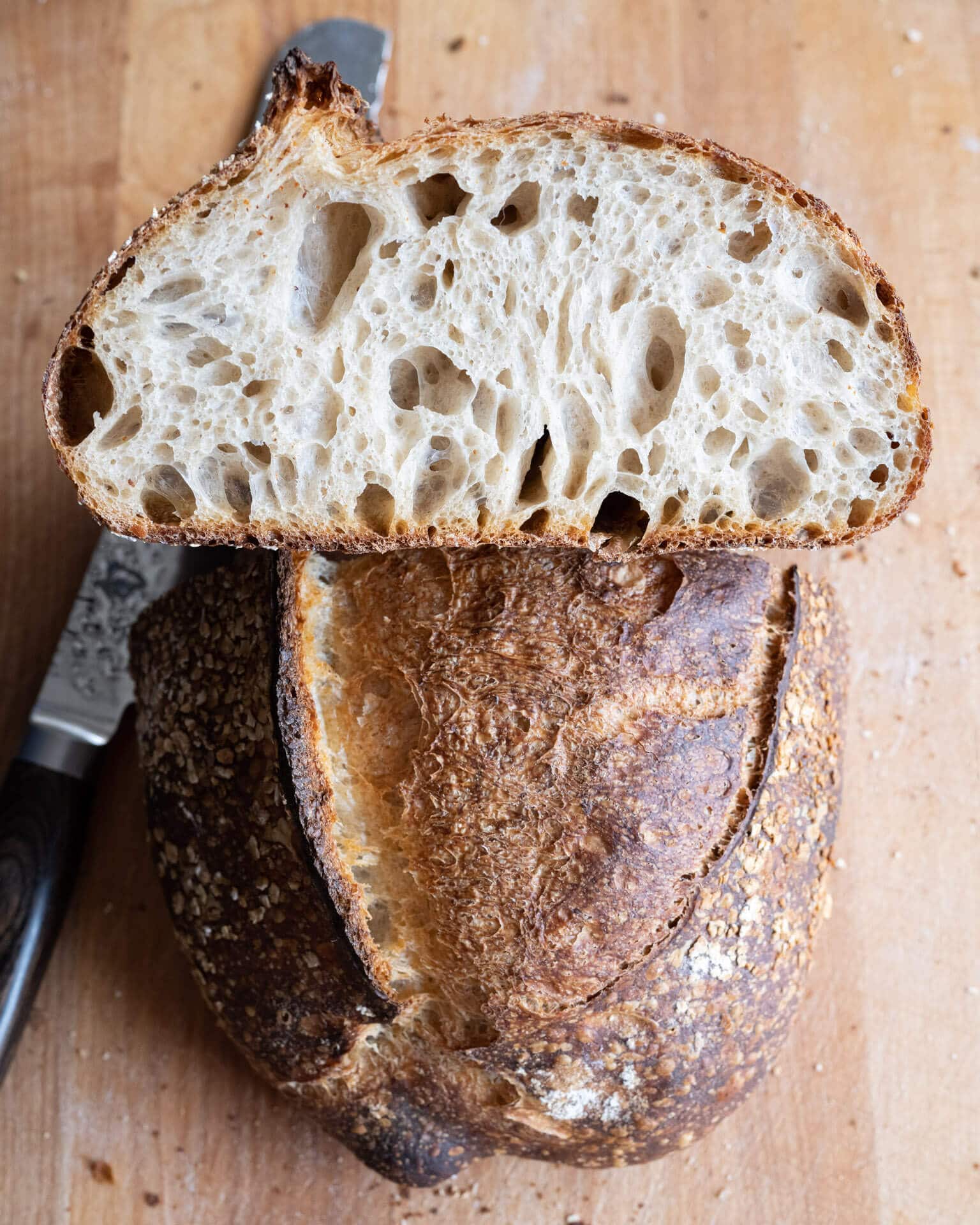 a loaf of bread that is sitting on a paper towel Stock Photo by