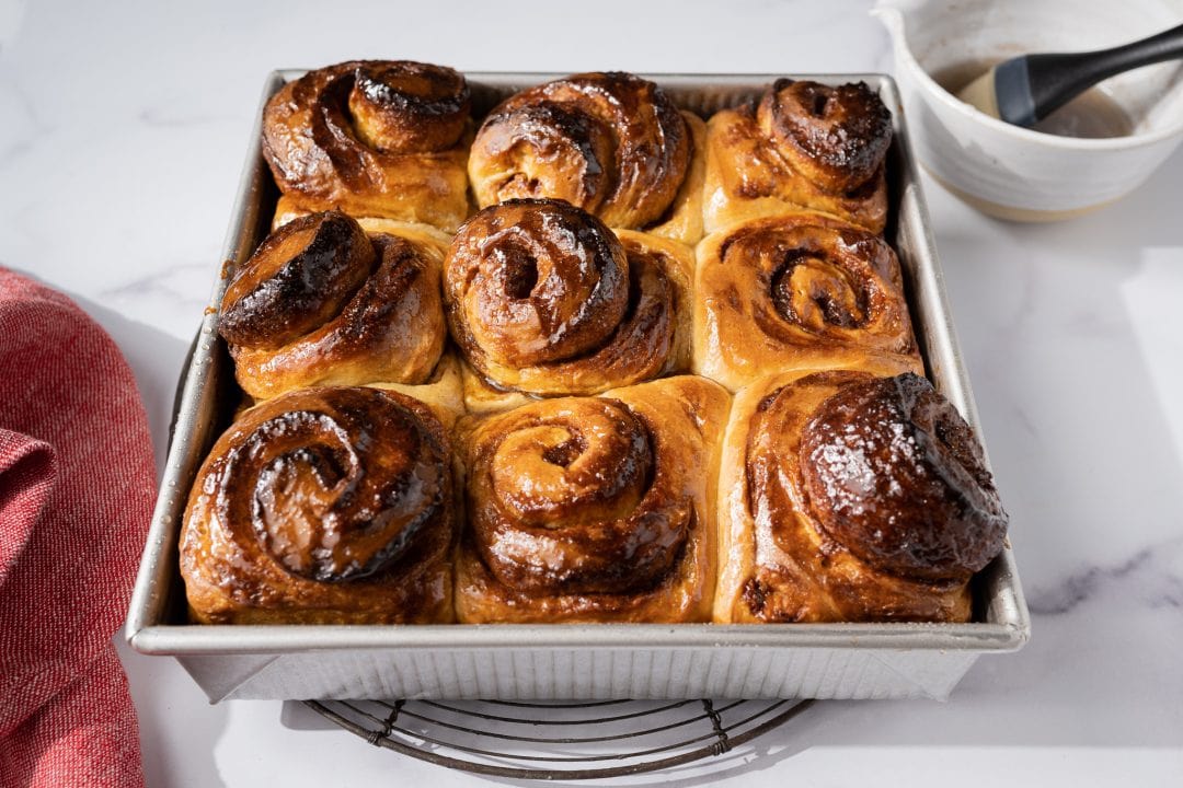 Cardamom rolls glazed with simple syrup