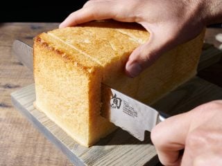 Slicing sourdough Japanese milk bread