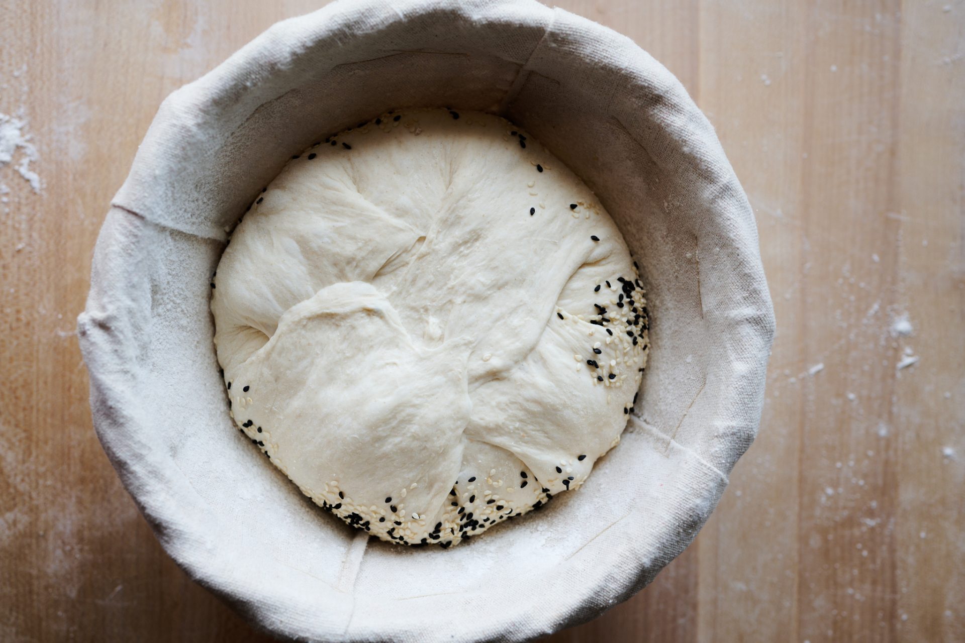 How to top bread dough with seeds and grains