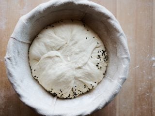 How to top bread dough with seeds and grains