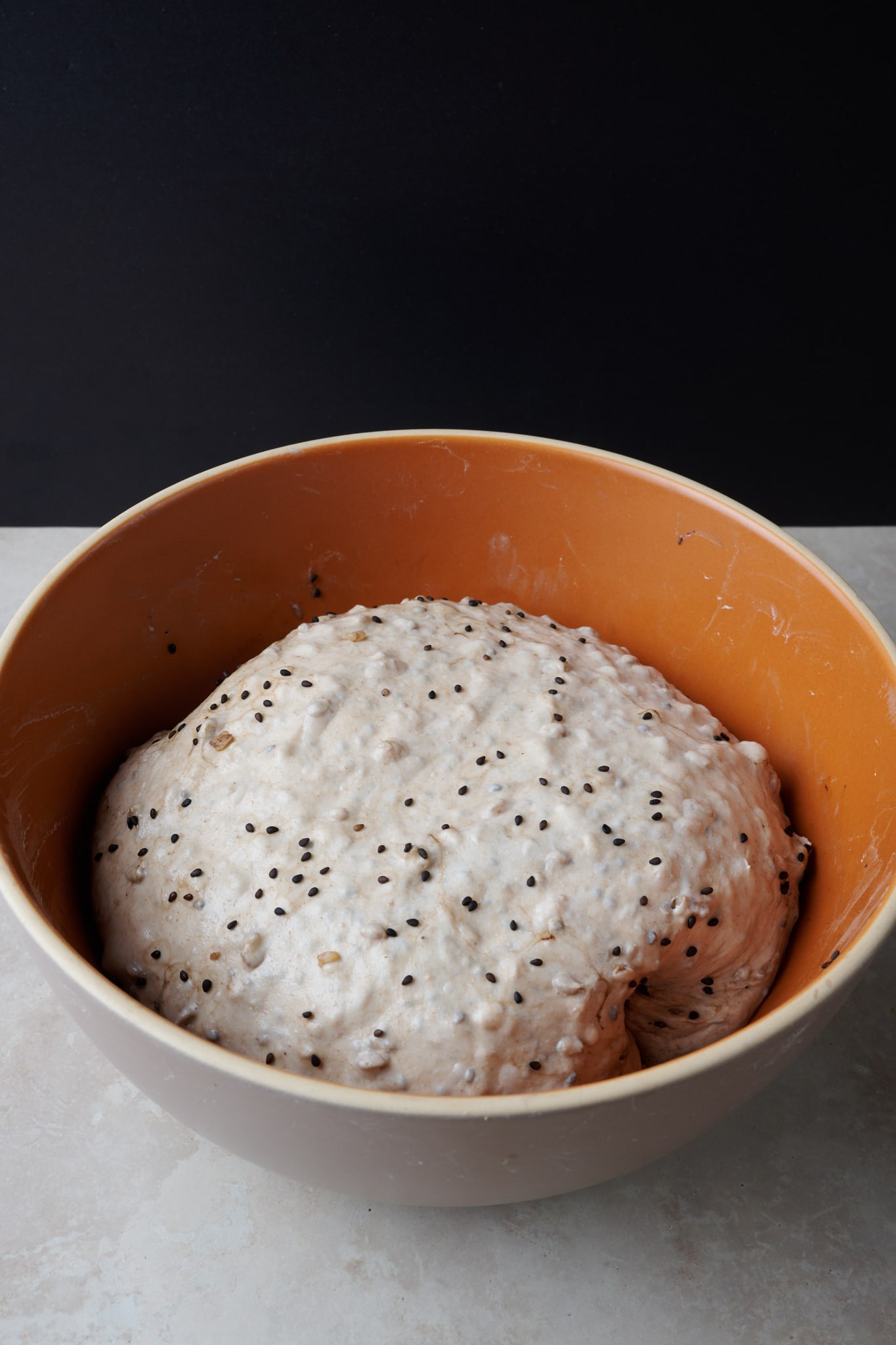 Brown rice and sesame dough in bulk fermentation