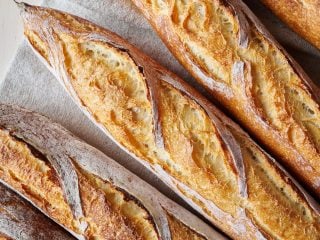 Shaping bread dough as a baguette