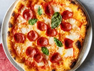 Shaping dough for pizza