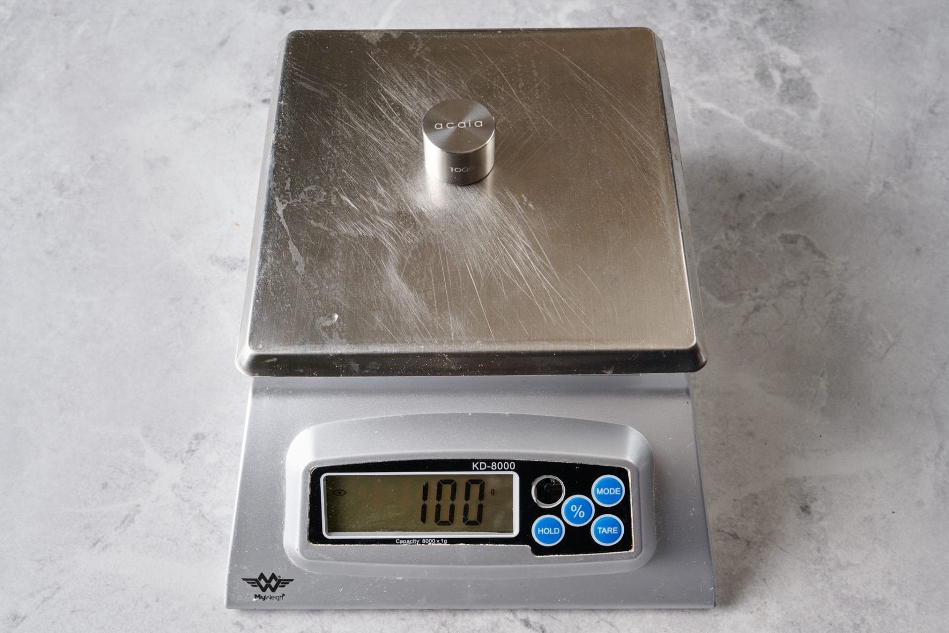 Testing the weighing accuracy of the MyWeigh scale.