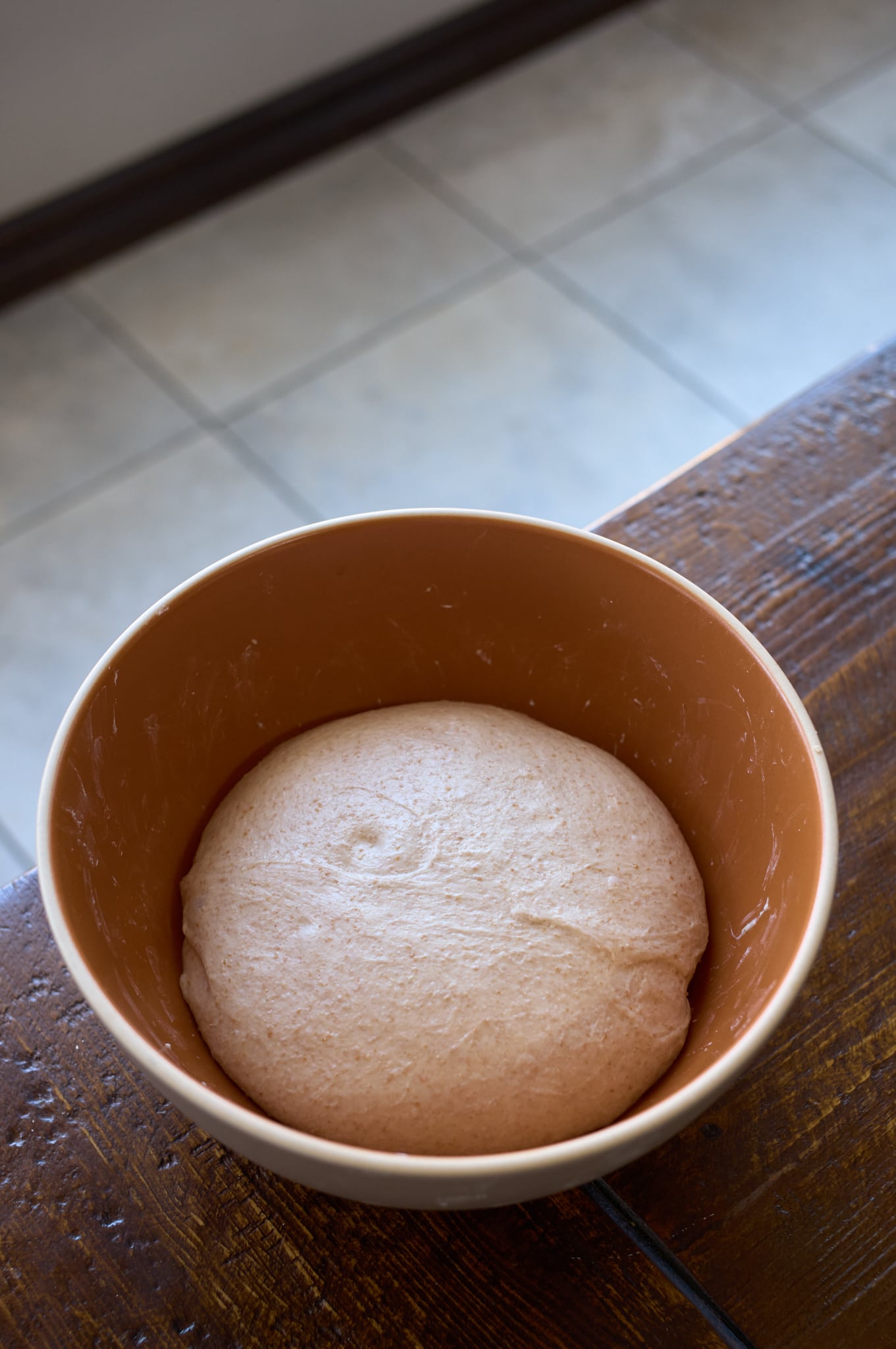 AI-generated sourdough bread recipe dough at the end of bulk fermentation.
