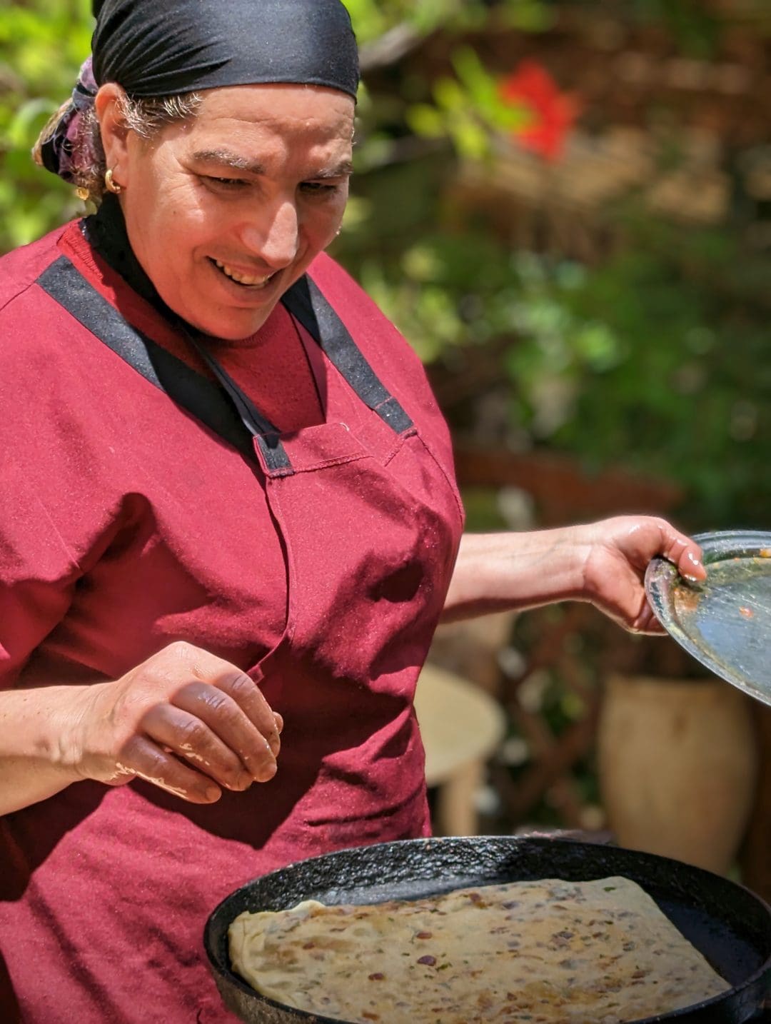 Woman making M'lawi in Morocco