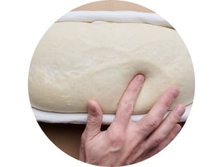 Dough poke test circular icon.