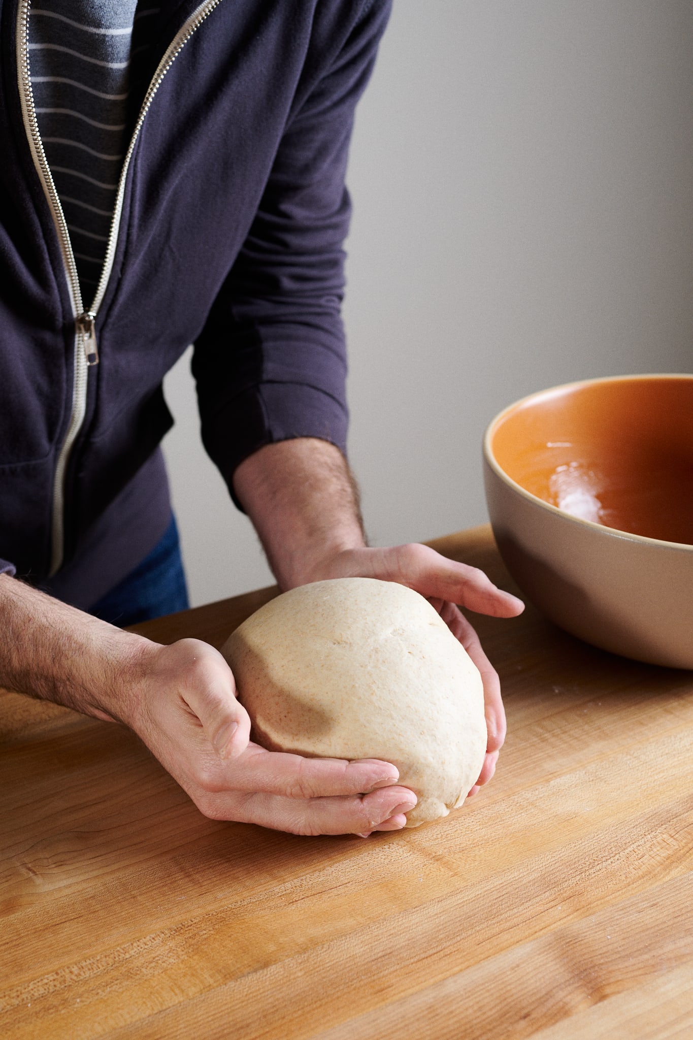 After mixing, ball the dough up and place into bulk fermentation container.