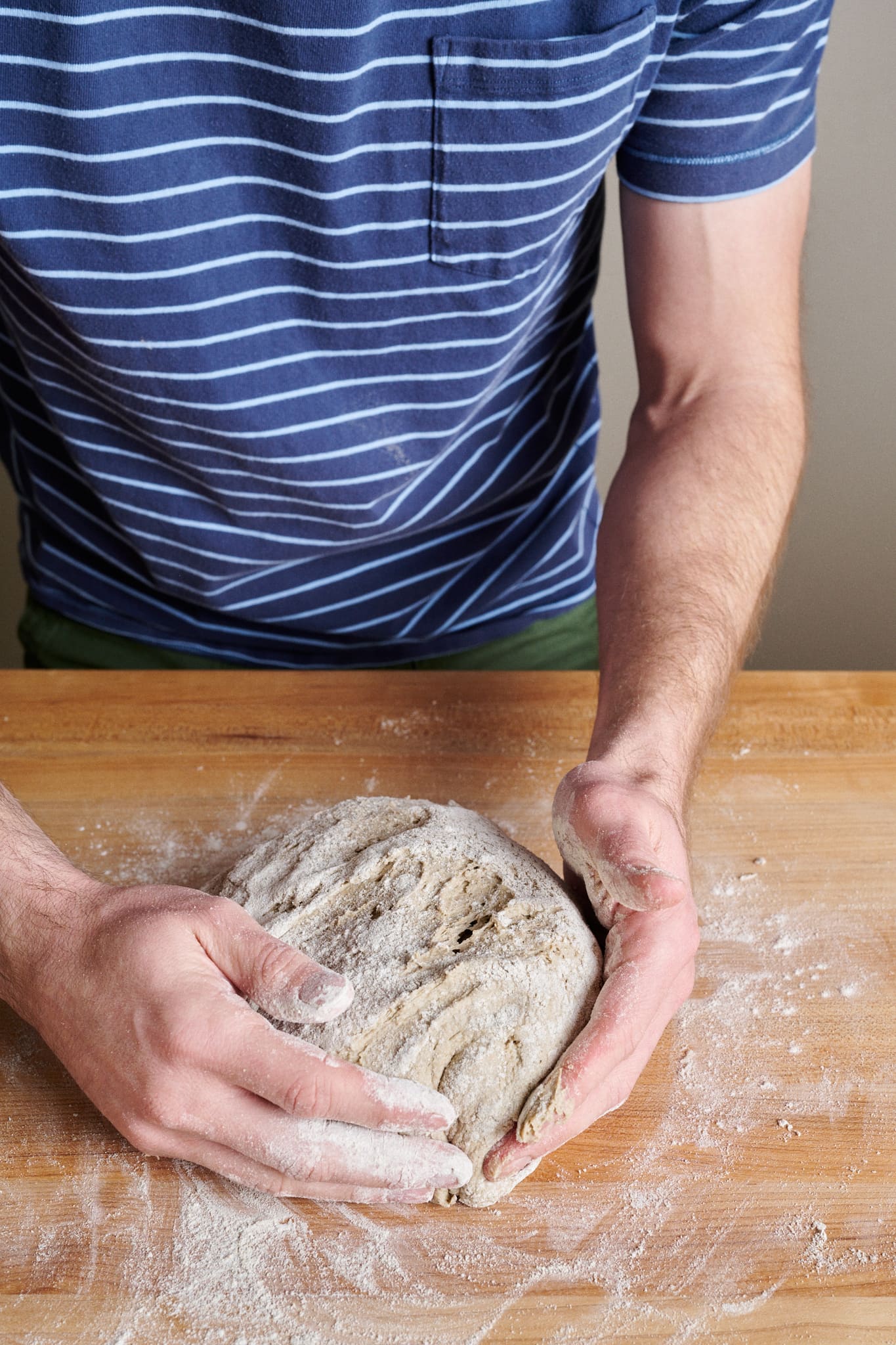 After folding, round the dough.