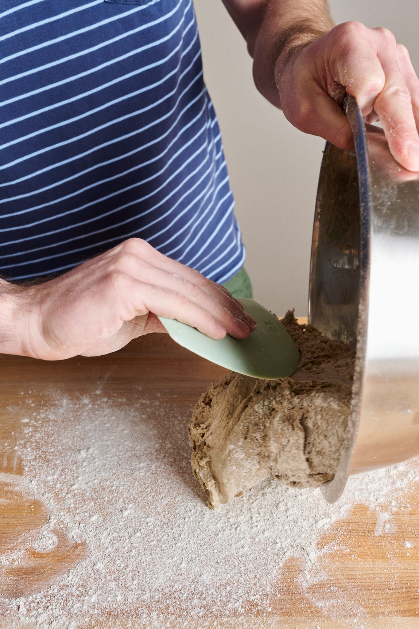 Scrape the dough out to a floured work surface.