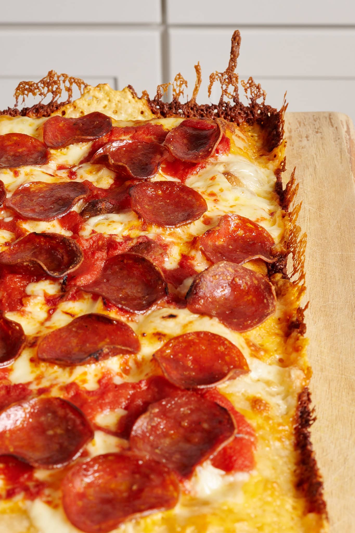 Crispy frico crust on a sourdough Detroit-style pizza
