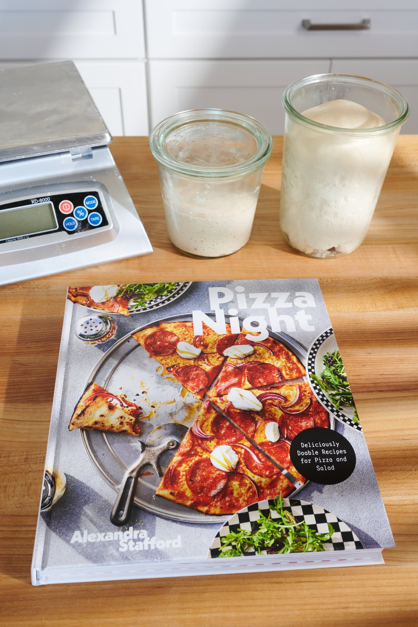 Alexandra Stafford's Pizza Night Cookbook on a table