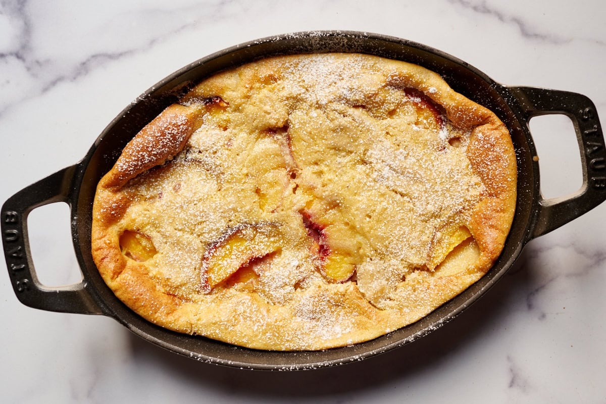Unwrap the sourdough clafoutis in a Staub baking dish.