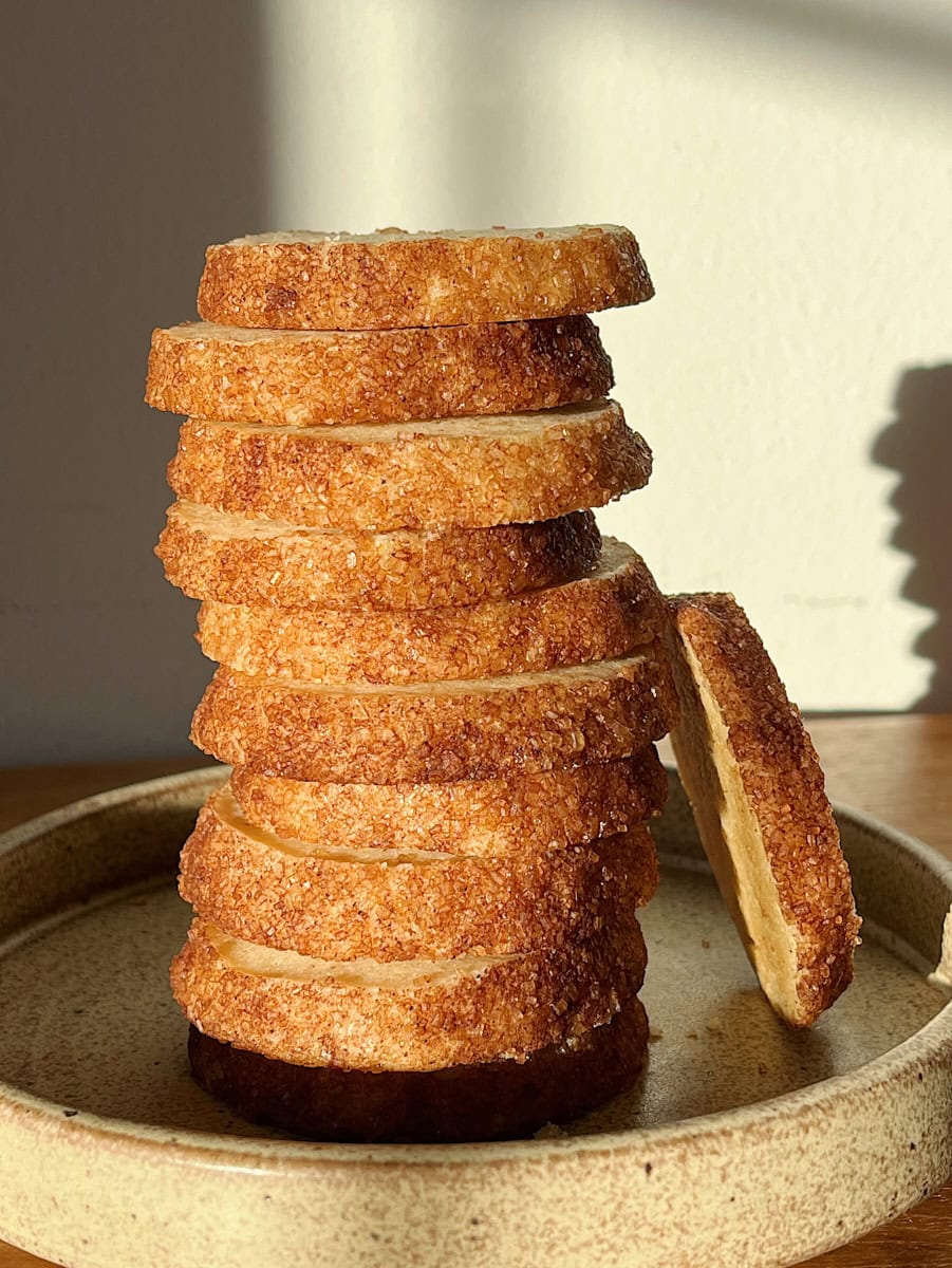 Slice and bake cinnamon toast cookies stacked tall.