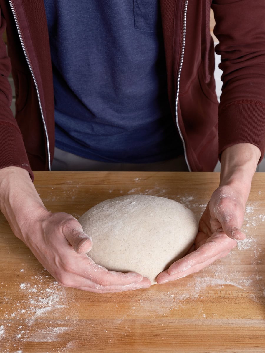 Shaping bread dough with the gather up method.