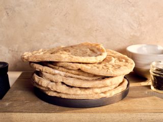 Whole wheat sourdough pita on a plate