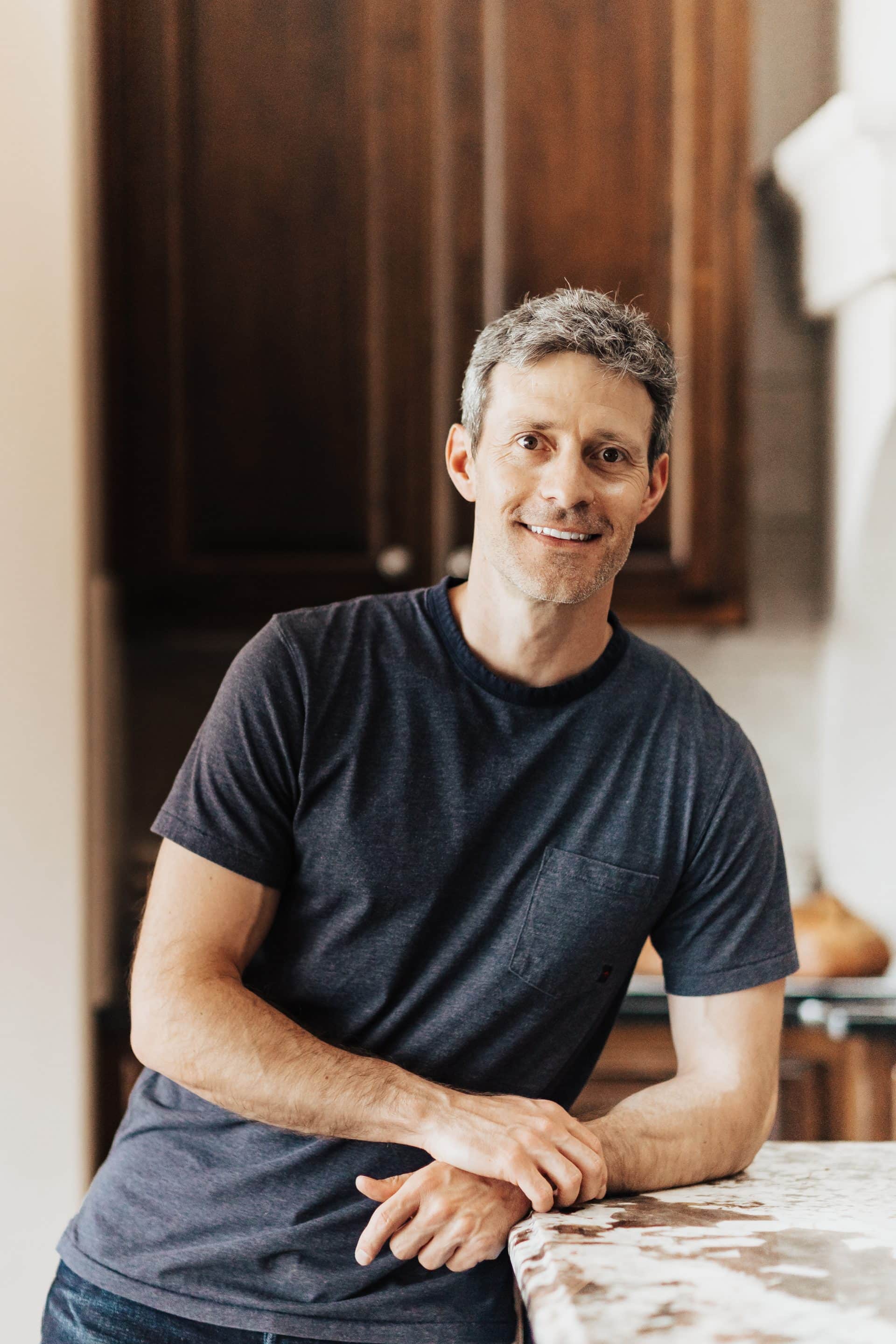 MaurizIo Leo in his home kitchen.